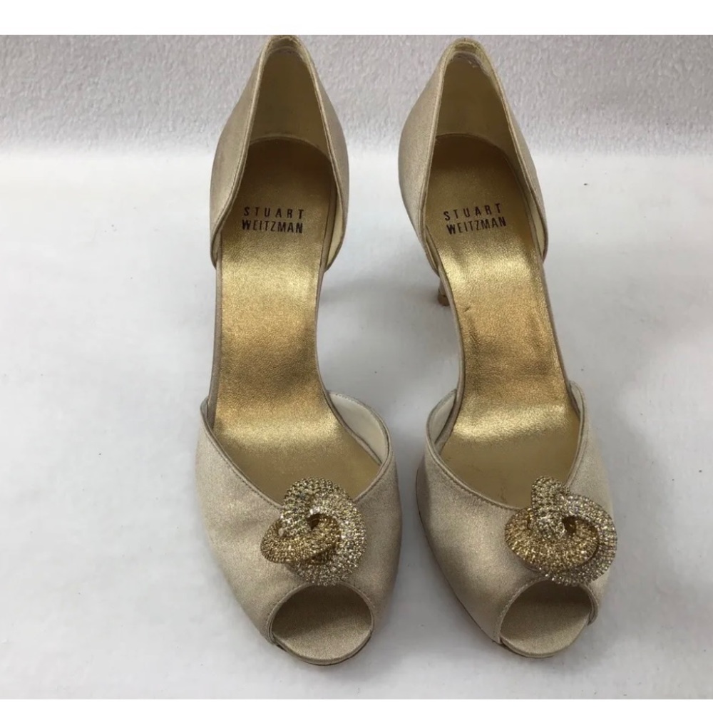 stuart weitzman trisoli gold crystal knot pumps.